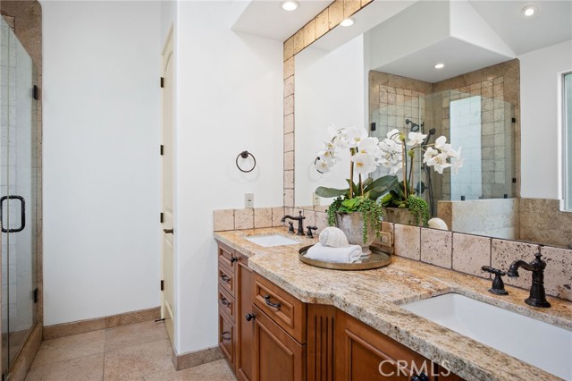 Double sink vanity and private toilet