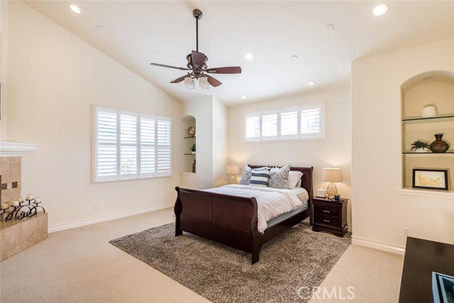 Relax in this huge master bedroom complete with walk-in closet, ensuite bathroom, built-ins and fireplace!