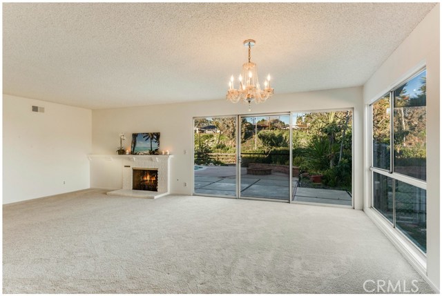 Family/Living room - main exit to backyard (1 of 3 sliding doors to the backyard).