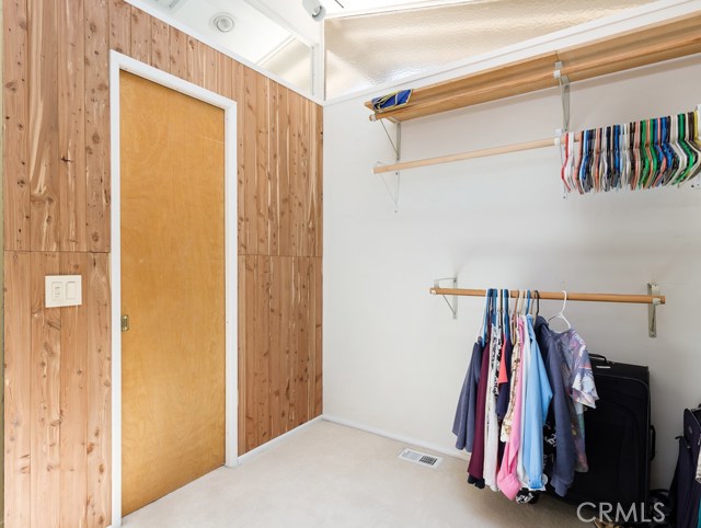 Master closet and fresh Cedar paneling.