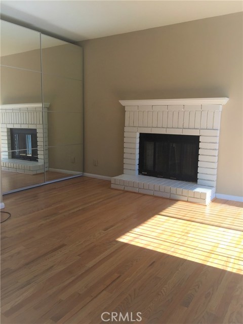 Gleaming Hardwood Floors in Master Bedroom