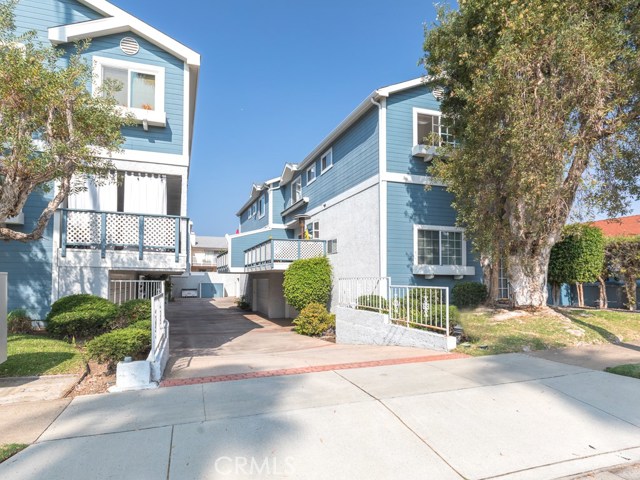 A view of the driveway that leads to the garage.