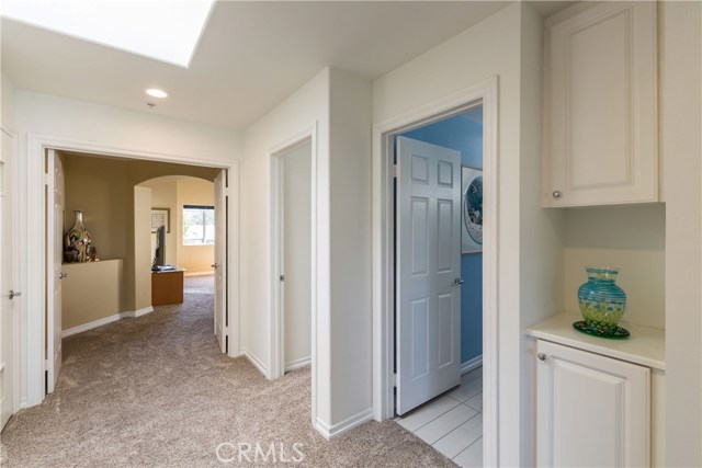 Hallway showing Entrance to Master Suite, Skylight, Bedroom 1, Bathroom & Linen Cupboard