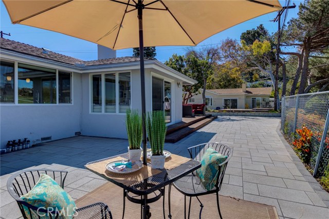 The spacious patio, deck, and fenced backyard enhance your outdoor living space.