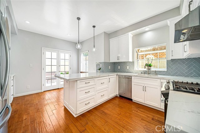 There is a breakfast nook area with french doors that lead out to the private backyard.