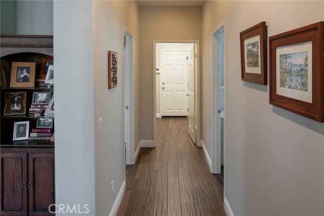 Downstairs hallway leading to laundry room and garage