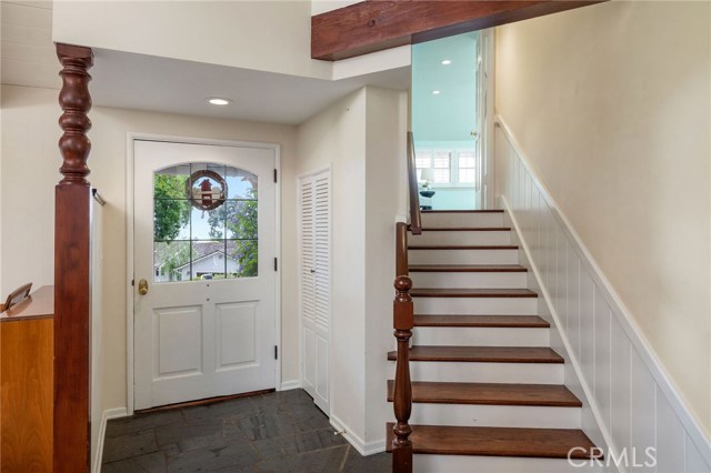 The well located primary bedroom suite at the front of the home features it's own staircase and entry. With the best views of the ocean at the front, this primary bedroom suite has one of the best seats in the house.