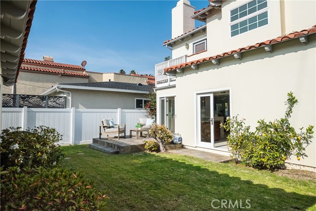 South-facing backyard with French doors to breakfast nook and family room