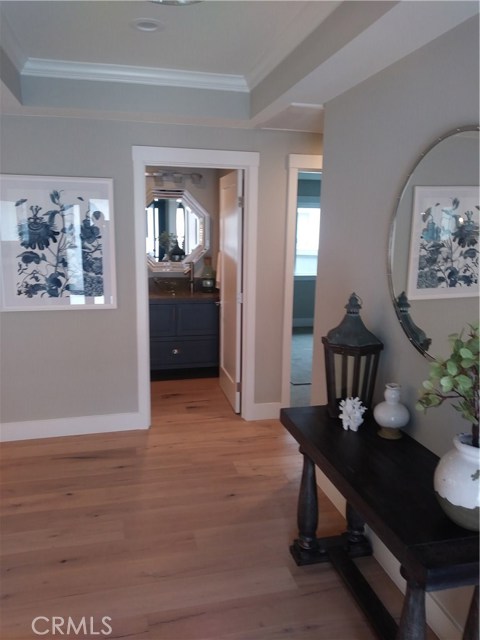 ENTRY WAY, POWDER ROOM AND WHAT A ENGINEERED WIDE PLANK BEAUTIFUL FLOOR