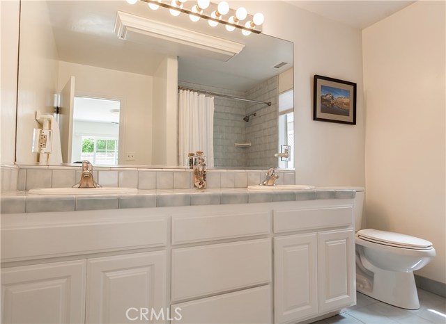Master bathroom has dual sinks, upgraded tile counters and floors and full tub/shower.