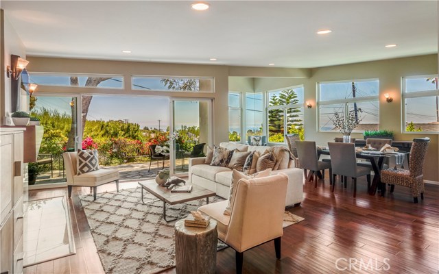 Living room and dining room with ocean and Catalina views. Picture doesn't do view justice it has a great view.