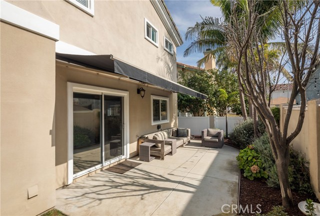 Custom awning provides shade from all of the natural light that flows into this home!!!!