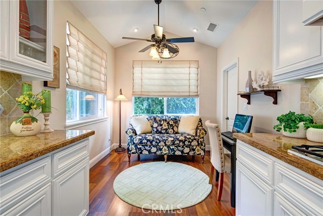 Granite countertops, all stainless steel appliances, 5 burner stovetop, beautiful cherry wood floors, built in wine fridge, pantry, and breakfast nook!