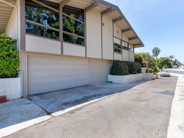 Paved alley access for the garage. 2 and 1/2 blocks walk down this alley and you are at beautiful local bluffs.