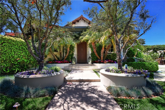 Welcoming private front entrance with entry gate.