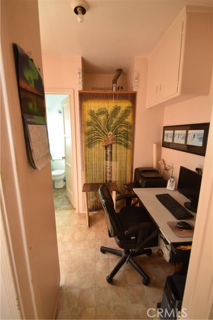 Laundry area where the tenants put a desk