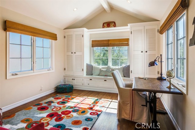 This room could be a bedroom, office, or kids playroom.  Lite and airy with a view of the hills.