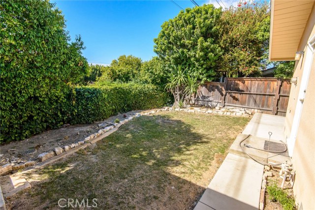 Backyard area has newer concrete.