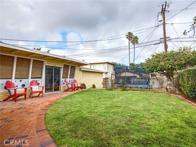The back yard view from the living room of the main house.