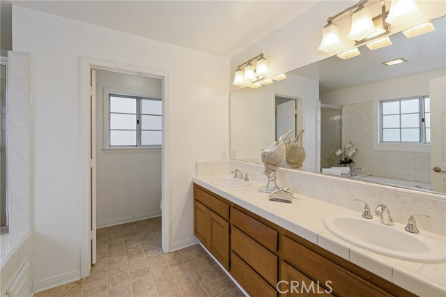 master bathroom with dual sinks and extra cabinet space.  
Bright and open.