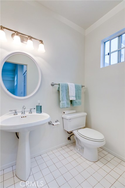 This 1/2 bath services the upper floor.