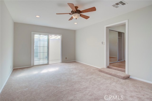 Cozy den opens up to the patio/yard