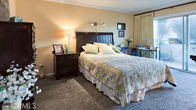 Another view of the Master with a sliding glass door leading to the extra large balcony