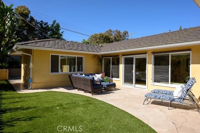 Spacious courtyard perfect for outdoor dining with views of the golf course and PV Hills.