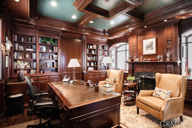 Paneled den with copper ceilings and cigar room