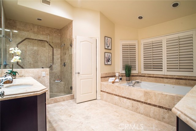 The master retreat of all retreats... his and hers separate sinks/vanities; private loo,double shower heads, and more!