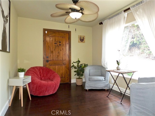 Main house 4th bedroom, door leads to shared deck between the main and guest house