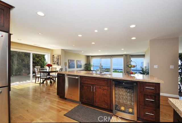 View from the kitchen and the island and family room, all enjoying the view.