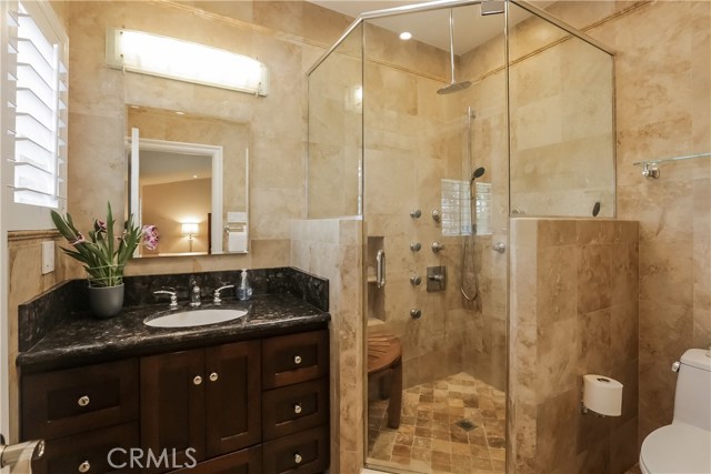 Master bath, frameless shower doors, designer touches.