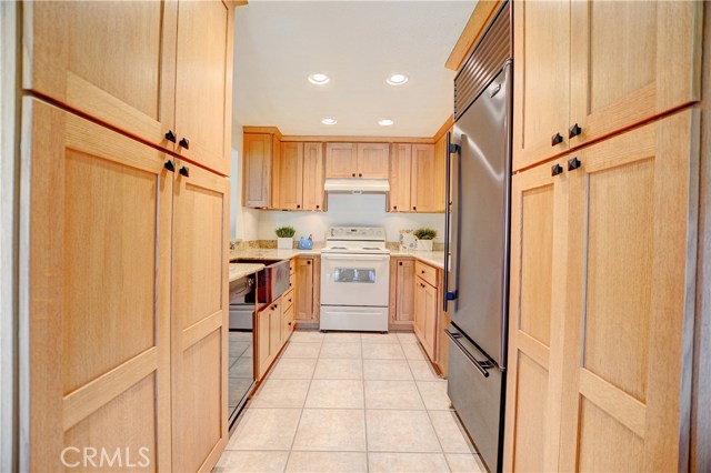 Fully remodeled kitchen with tile flooring Fully remodeled kitchen with tile flooring