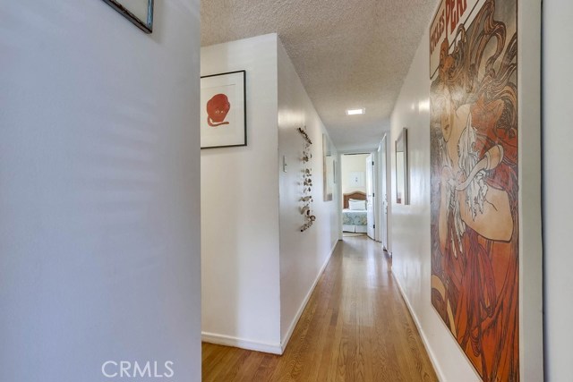 Hall to the Master suite and additional bedrooms and bath