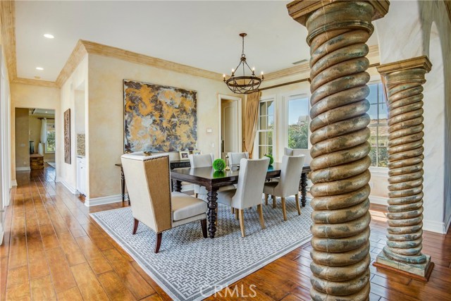 Formal dining room, there is a butler pantry and large walk in pantry in the hall towards the kitchen.