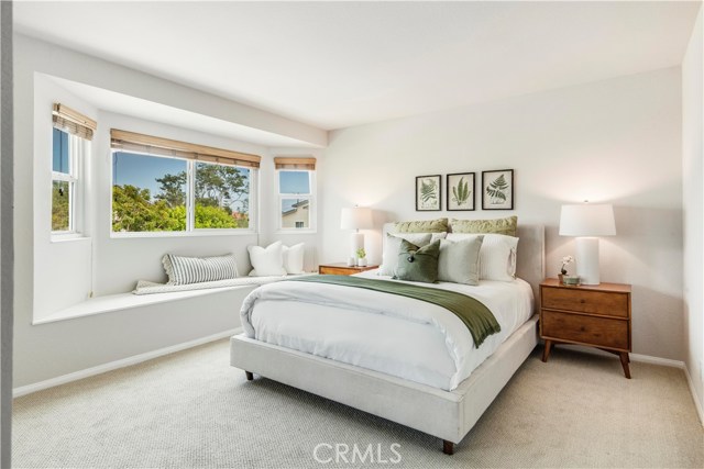 The front bedroom has a pretty bay window with a window seat.
