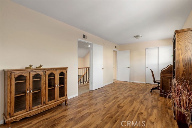 Closets on other side of room. Could be reconfigured to make it a 5 bedroom in needed. Just put the wall back up and then you'll have the original 5 bedroom model.