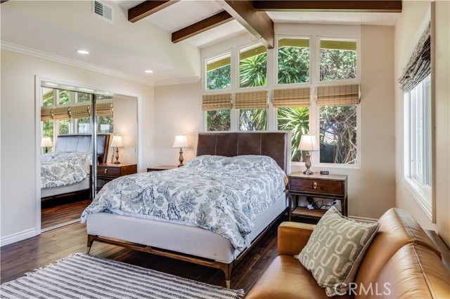 Master Bedroom with walk in closet and glass sliding closet