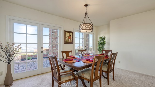 Formal dining room with panoramic views