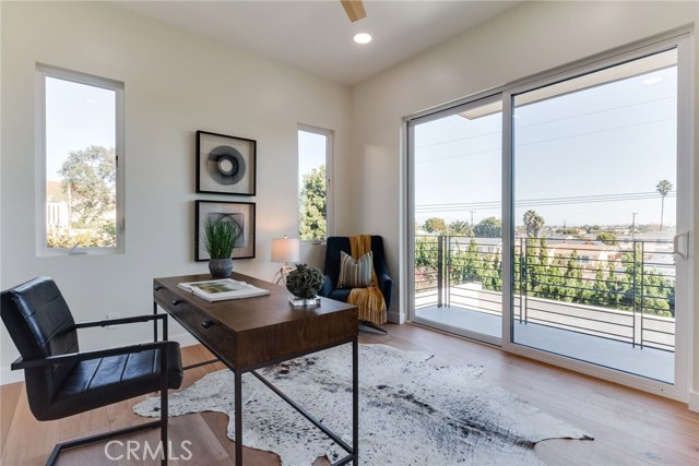 2nd bedroom with walk-in closet & patio with city view