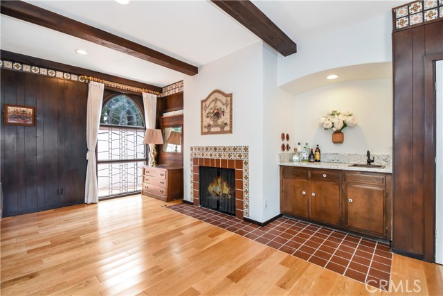 Main level bedroom with wet bar.