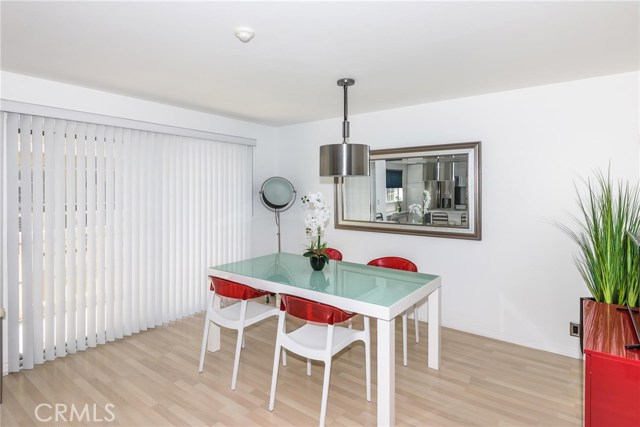 Nice dining room opens to balcony.