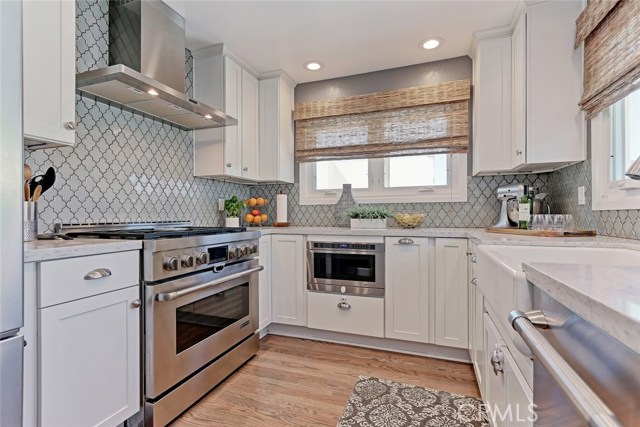 Kitchen includes microwave drawer, custom window treatments, self closing drawers, LED lighting, and new Pella windows.