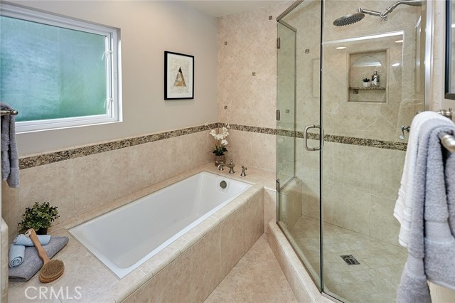 master tub and walk in shower