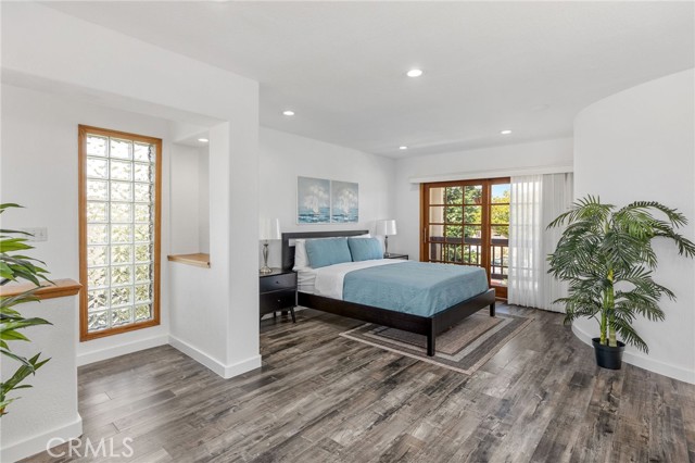 Spacious primary bedroom with sitting area