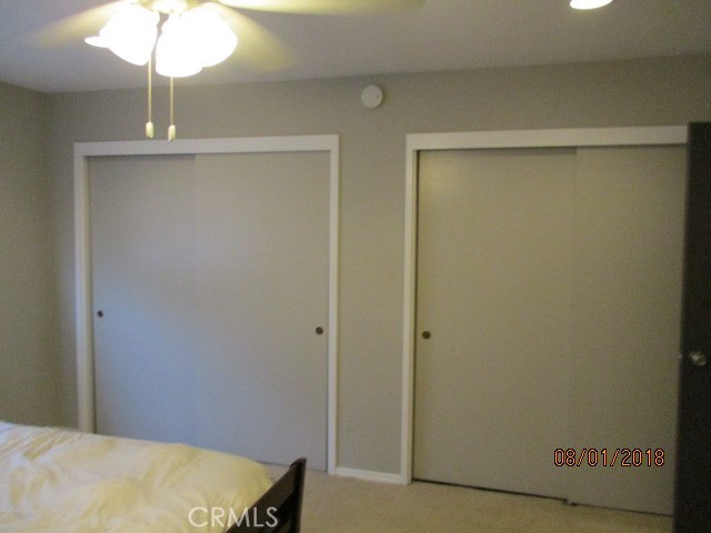 You seek closet space...look no further than the wall of closets in the bedroom!