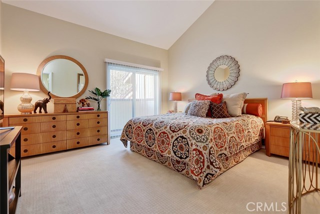 Upper level luxurious master suite has an adjacent private balcony.