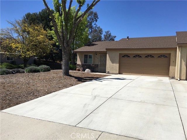 Concrete driveway with newer roof