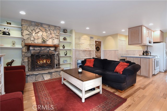 Family room with wood-burning fireplace